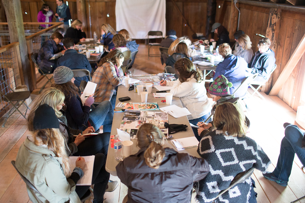 A group of students working on their vision boards at an on-farm Floret workshop