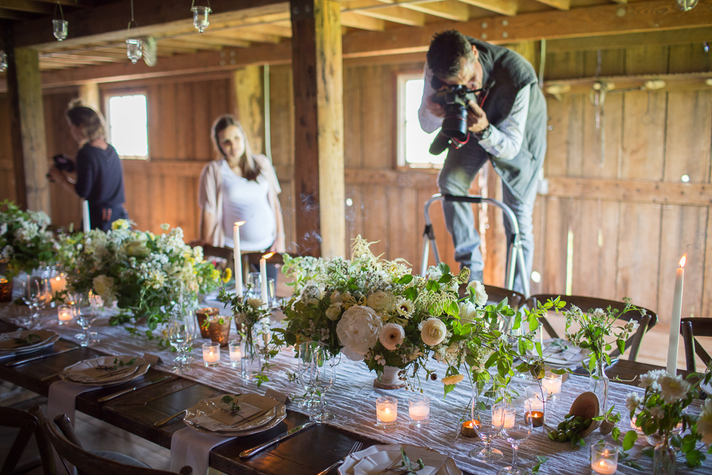 Chris Benzakein photographing a beautiful tablescape an on-farm Floret workshop